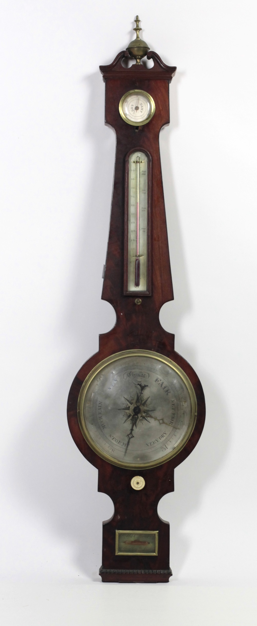 A 19th Century mahogany Barometer, with swan neck pediment and brass finial, by M. & C.