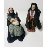 Two unusual Clay Figures, of a seated elderly Lady knitting,