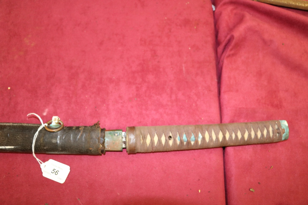 A large 19th Century Japanese Katana Sword, with 29 1/4" blade, in leather covered wooden scabbard, - Image 7 of 8