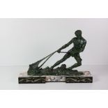 An attractive Art Deco period assimilated bronze Figure of a semi-nude Fisherman dragging a net,