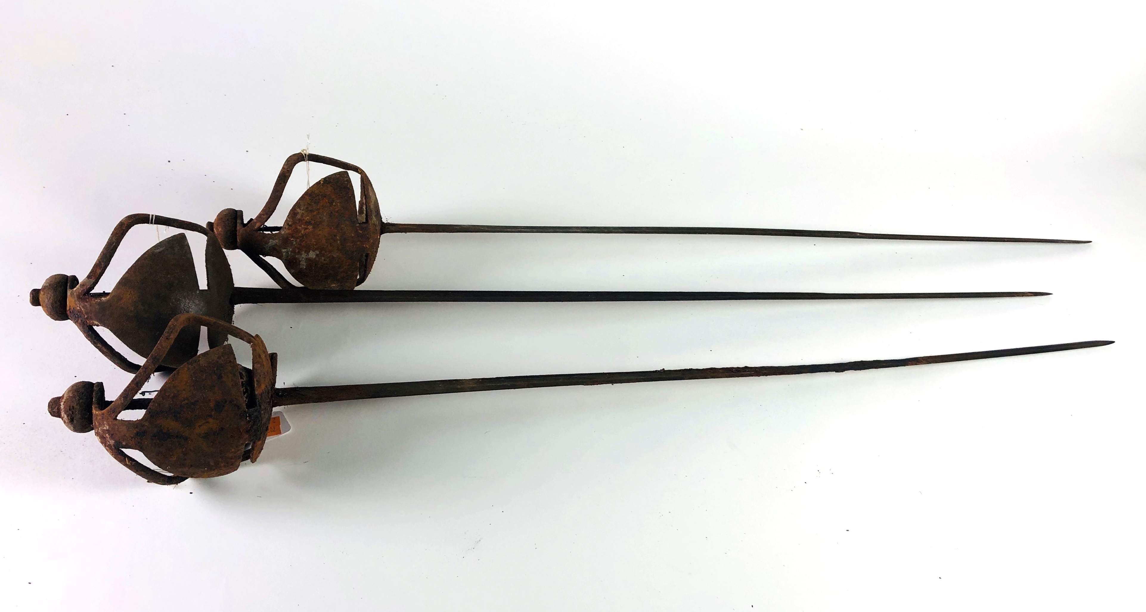 A rare matching set of 3, late 17th Century / early 18th basket hilted Cavalry Backswords,