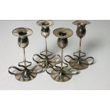 A set of four attractive Art Deco style Sterling silver Candlesticks, by Marcus & Co.