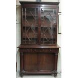 An attractive Nelson period two door Bookcase,