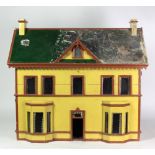 A Victorian period painted two storey Dolls House,