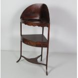 A 19th Century mahogany two tier Corner Washstand, with frieze drawer,