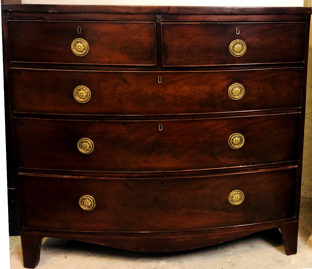 An early 19th Century inlaid mahogany bow fronted Chest,