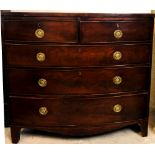 An early 19th Century inlaid mahogany bow fronted Chest,