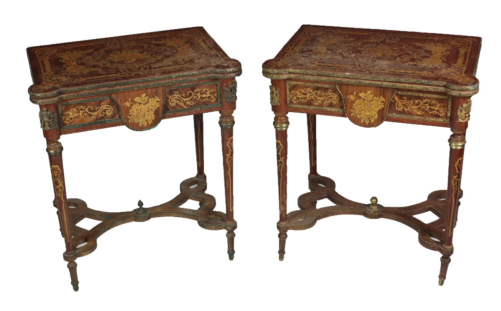 A pair of 19th Century French style profusely inlaid fold-over Card Tables,