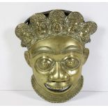 A heavy bronze 19th Century African (Gold Coast) Wall Mount, modelled as a mask,