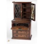 A late Georgian mahogany miniature Apprentice Secretaire Bookcase,