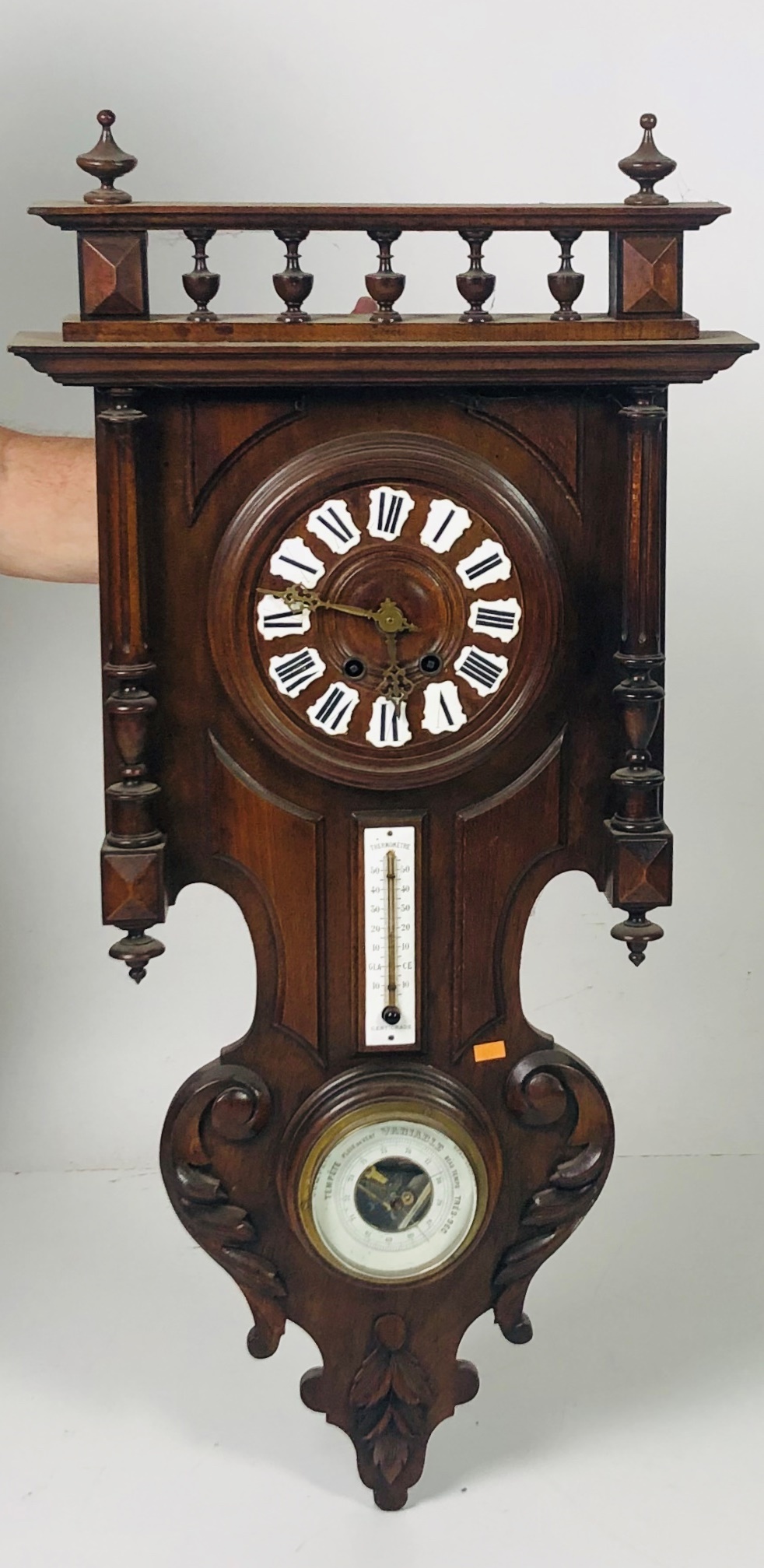 A Vienna Wall Wagger type Clock, Thermometer and Barometer on a shaped base and gallery top.