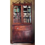 A George III period inlaid Secretaire Bookcase, with open scroll top,