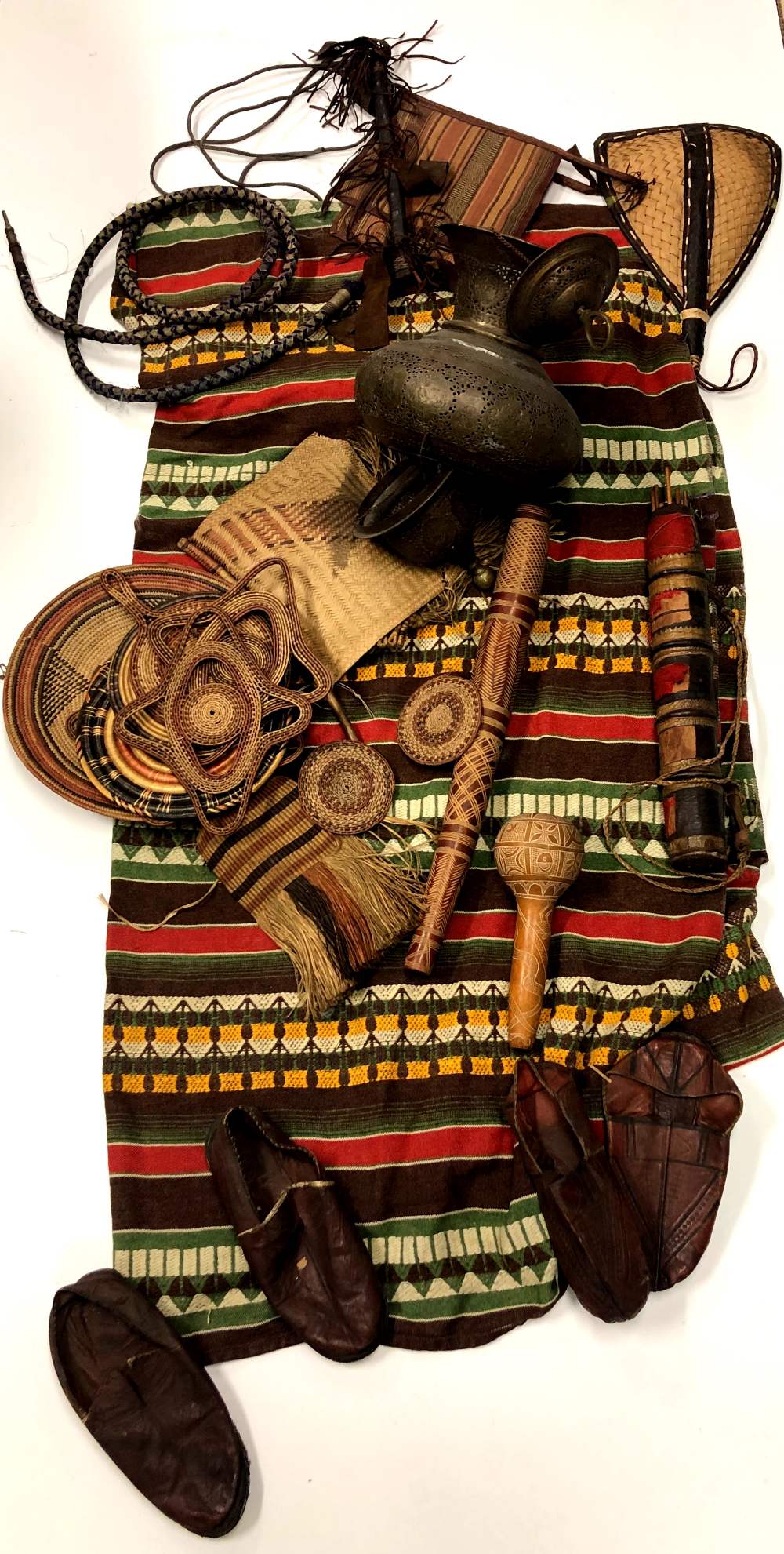 Ethnographical: A large and varied collection of African Items, including brass ceiling lights,