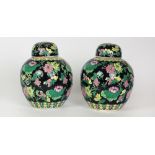 A pair of 19th Century Famille Verte Ginger Jars, decorated with floral design, each approx.