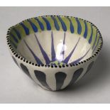 An attractive and colourful ceramic Bowl, by John French with sunburst interior, signed on base,