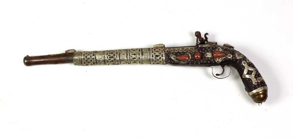 A late 18th Century / early 19th Century Middle Eastern flintlock long barrel Pistol,