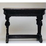 A 19th Century Cromwellian style carved oak Hall Table, of low proportions,