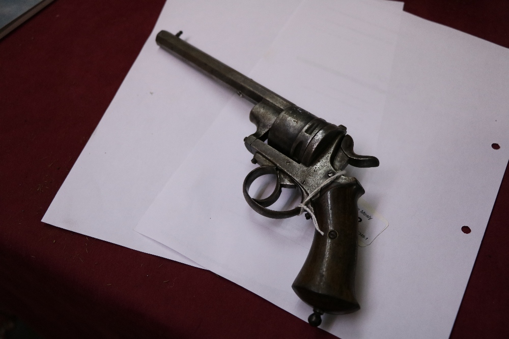 A 19th Century American Revolver, with wooden handle and six shot chamber, and leather holster. - Image 5 of 7