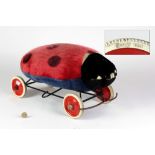 A rare 1940's Steiff Ladybug on wheels, signed.