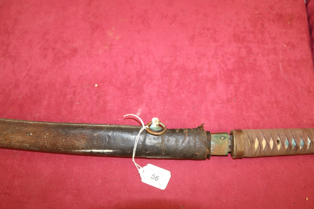 A large 19th Century Japanese Katana Sword, with 29 1/4" blade, in leather covered wooden scabbard, - Image 6 of 8
