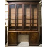 A 19th Century mahogany and pitch pine four door Bookcase, of unusual design,