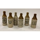 A good collection of 54 late 19th Century glazed earthenware Mineral Bottles,