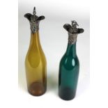 An attractive pair of very early Victorian silver mounted tall orange and green glass Wine