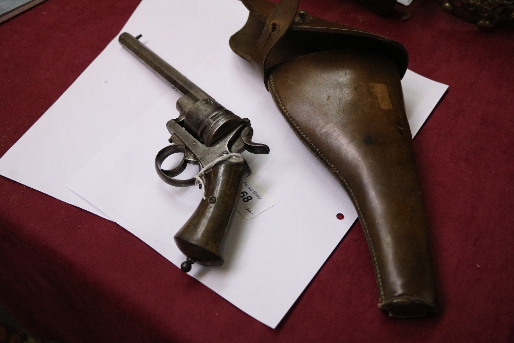 A 19th Century American Revolver, with wooden handle and six shot chamber, and leather holster. - Image 7 of 7