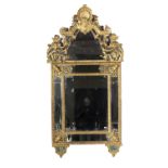 An impressive and large early 18th Century Continental compartmental giltwood Mirror,