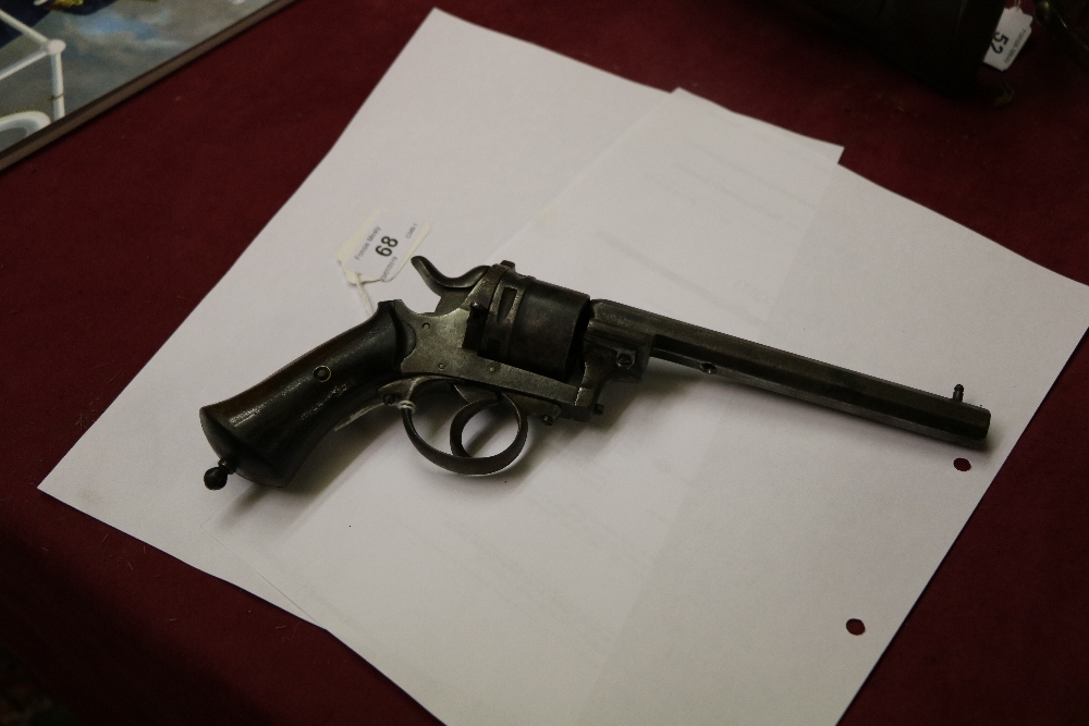 A 19th Century American Revolver, with wooden handle and six shot chamber, and leather holster. - Image 2 of 7