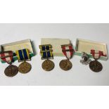 Military interest: A set of 3, Seirbhis Naisiunta, 1939 - 1946 brass Medals & Ribbons, boxed,