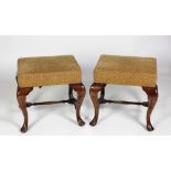 A pair of George II style mahogany framed and upholstered Footstools,