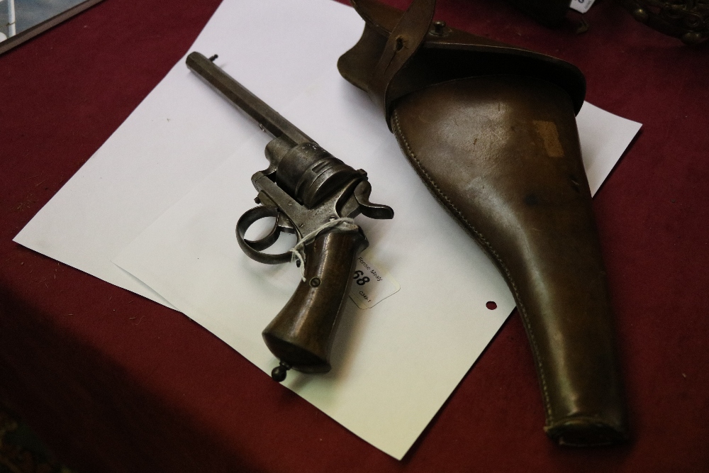 A 19th Century American Revolver, with wooden handle and six shot chamber, and leather holster. - Image 6 of 7