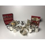 A large collection of Plateware, including teapots, creamers, coffee pots, tray,