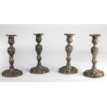 A highly important and attractive set of 4 late George III rococo style heavy silver Candlesticks,