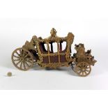 A carved and pierced wooden Model of the Dublin Lord Mayor Horse Drawn Carriage, with ornate design.