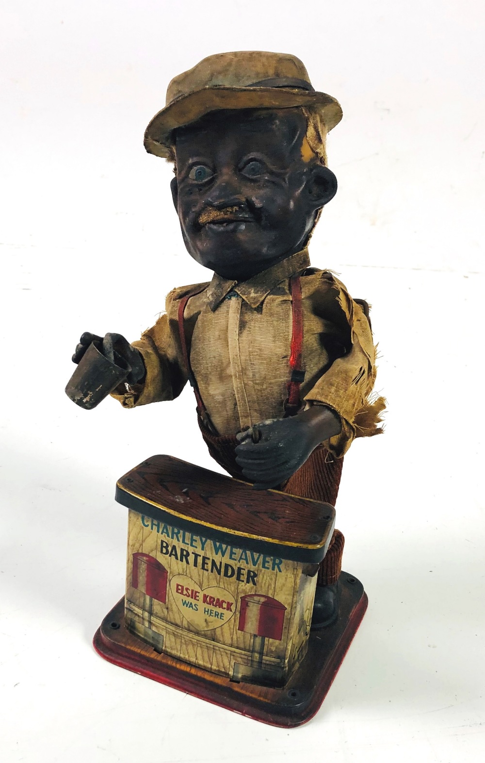 A Charlie Weaver "Bartender" automated Toy.