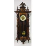 A good quality walnut Victorian Vienna Wall Wagger, with circular dial,