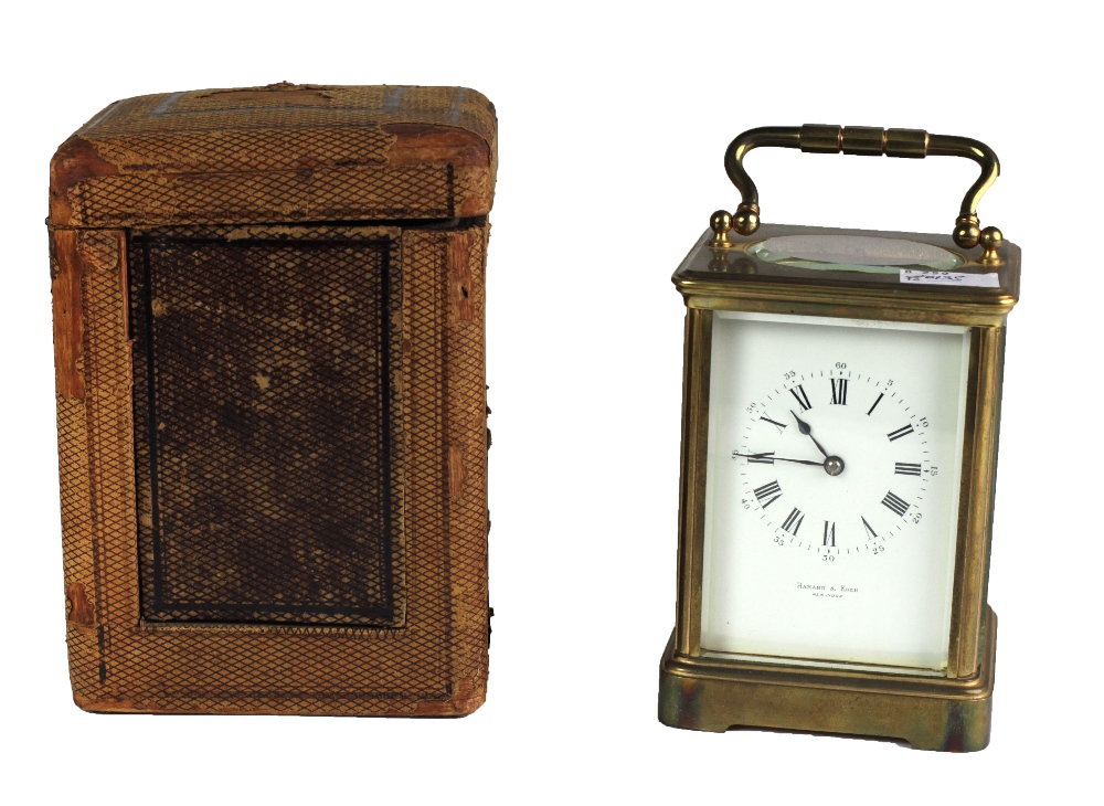 A good brass Carriage Clock, by Hamann & Koch, New York, with Roman numeral dial,