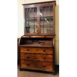 A William IV period mahogany cylinder top Bureau Bookcase, possibly Cork,