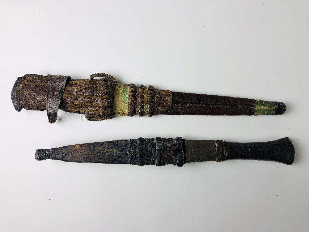 Two 19th Century African Daggers, with decorated leather scabbards and handles. - Image 3 of 3