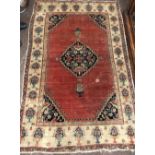 An antique Oriental Rug,