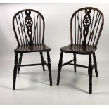 A set of 6 wheel back oak "Windsor" type Dining Chairs.