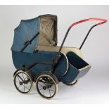 A Dolls Pram, c. 1950, with folding top (worn) and a similar Dolls Pram with blue covering.