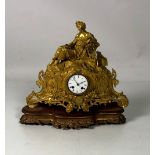 An attractive 19th Century French ormolu Mantle Clock, with a reclining Lady holding a lyre in hand,