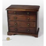 A 19th Century mahogany miniature Apprentice Chest,