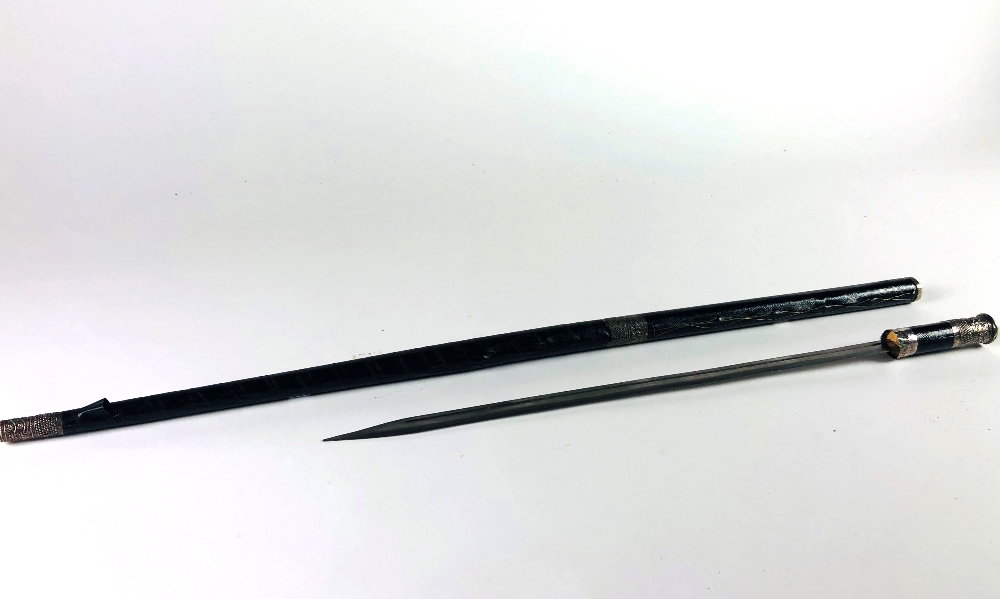 A Middle Eastern silver mounted Sword Stick, with steel blade.