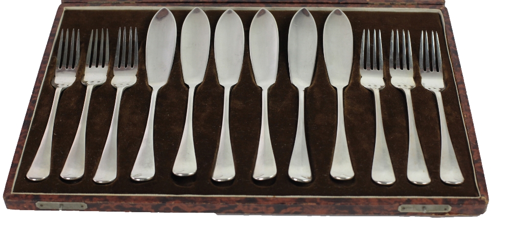 A good heavy English silver cased set of six pairs of Fish Knives and forks, Sheffield c.