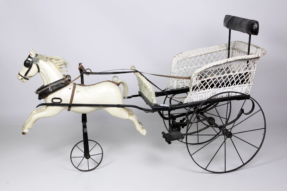 An Edwardian period wicker work and wrought iron framed Child's Horse Tricycle Carriage,