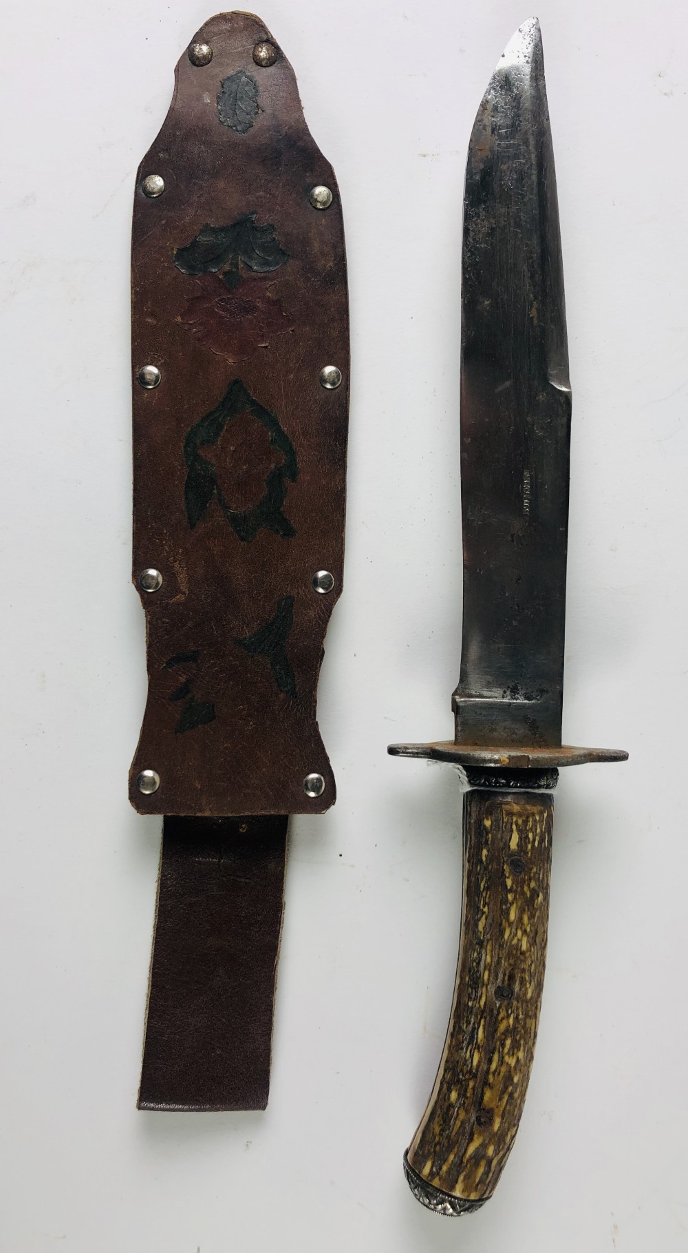 A typical early 19th Century Bowie Knife, with 8 1/2" German steel blade, stamped F.